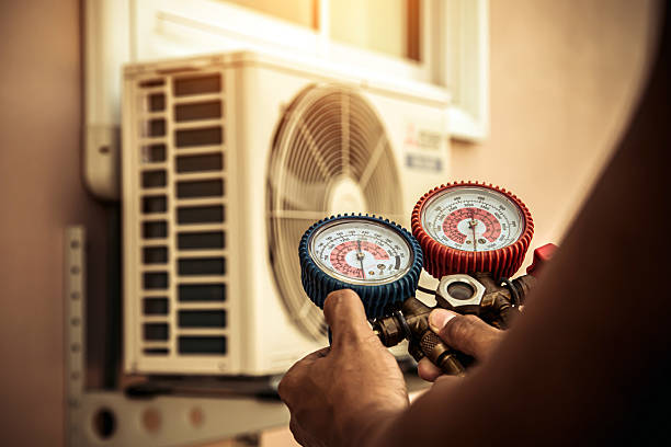 Professional Hvac Installation technician working in Harrah, WA